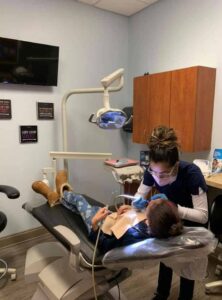 girl on a dentist chair
